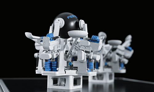 LearningGripper: self-learning gripper system for positioning round objects