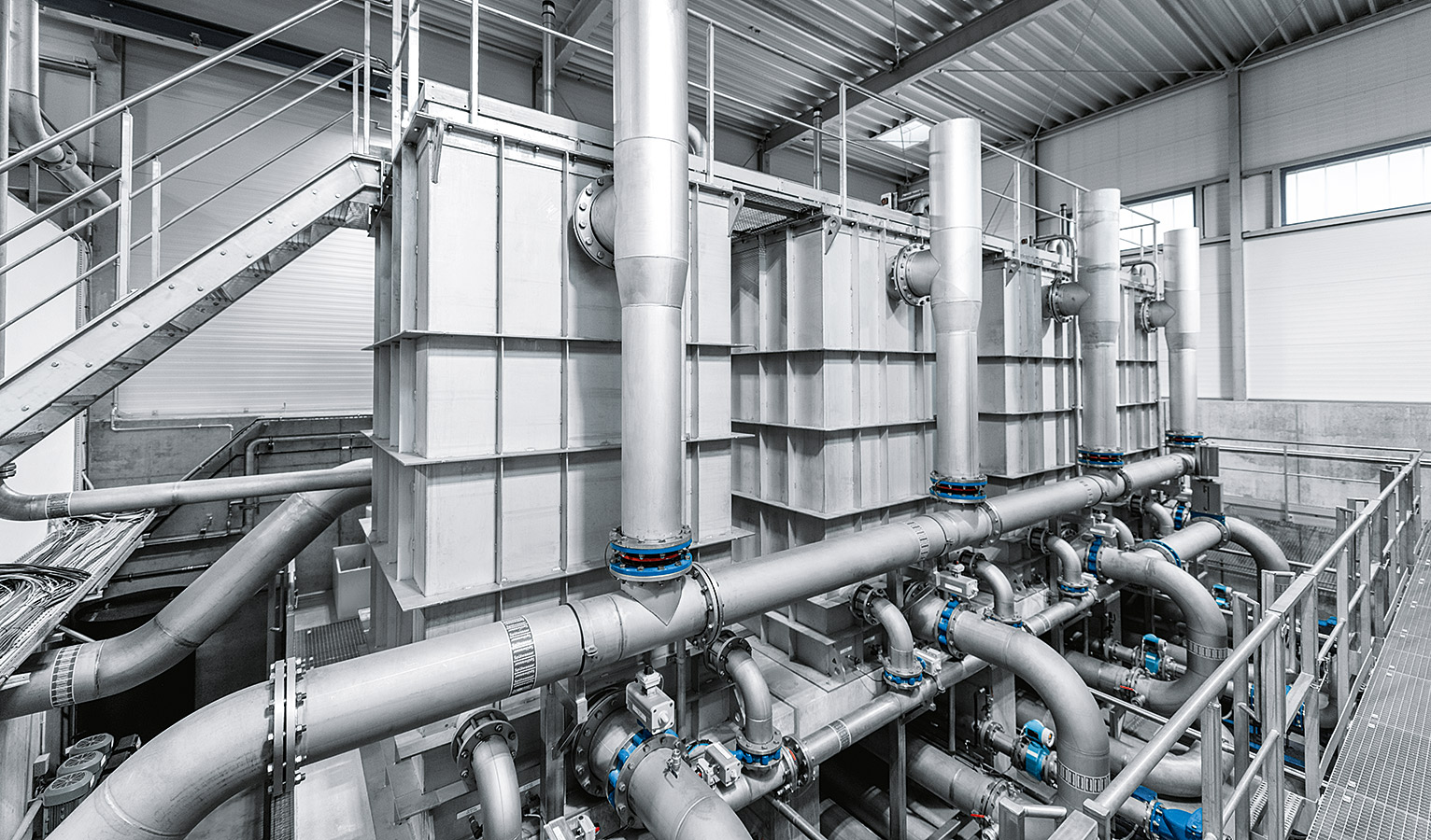 In place of a large clarifier, the much smaller Fuzzy Filter® system is all that is needed for Festo components to regulate the water flow.