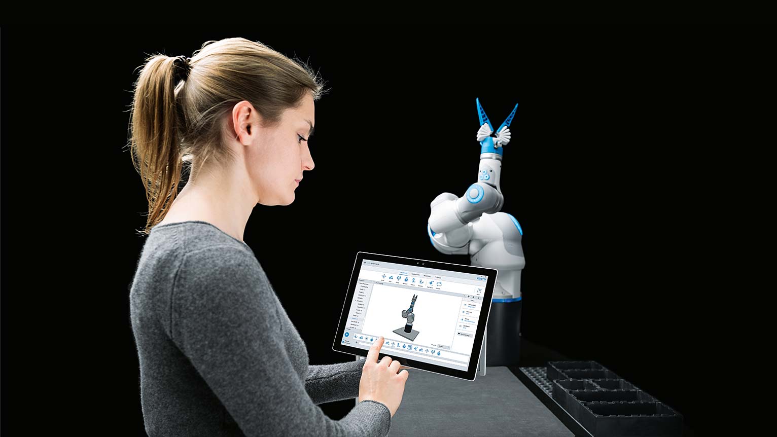 Nadine Kärcher with Robotic Suite, multi-award-winning programming software for the BionicCobot which she helped to develop.