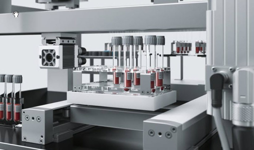 Planar surface gantry transports the vials