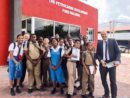 Goran Miladinov with a group of students in front of the FACT Centre.