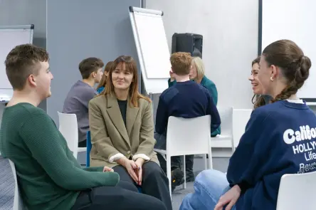 Festo Lithuania colleague in discussion with university students