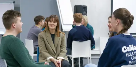 Festo Lithuania colleague in discussion with university students