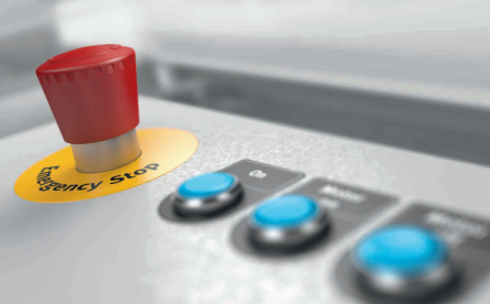 Illustration d'un chapitre de la formation sécurité machine Festo avec un bouton d'arrêt d'urgence