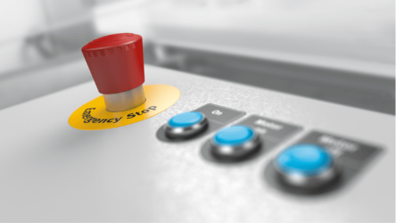 Red emergency stop button illustrating machine safety