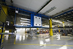Das Regalbediengerät ist eine effiziente Kostenbremse: Handlingaufwand und Fehlerquote in der Produktion werden minimiert.