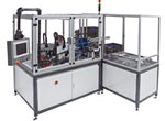 L'automate de montage effectue le surmoulage et la palettisation des pièces moulées par injection pour les machines à café Nespresso.